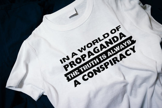 In a world full of propaganda, the truth is always a conspiracy Classic T-Shirt